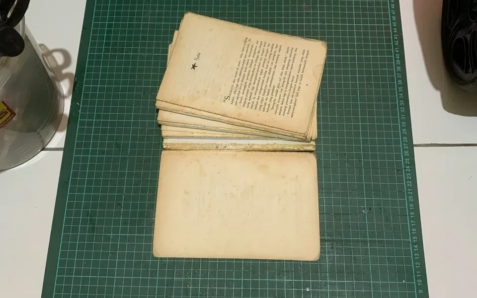 Loose page repair on cutting mat